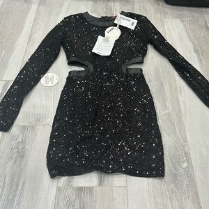 black sequin dress with side cut outs